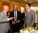 Rep. Chaka Fattah learns about aqauaponics and engaging kids in STEM from members of Tulsa Champ.